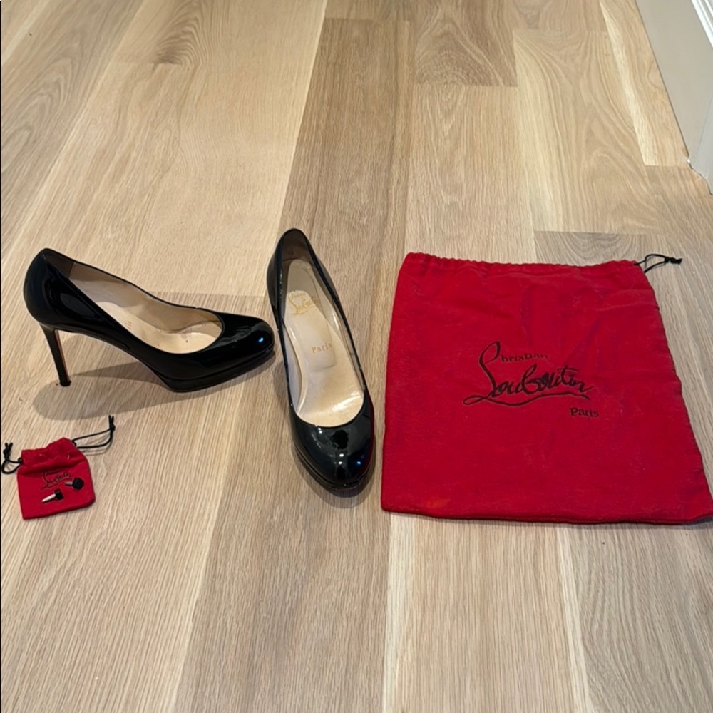 Black patent leather Christian Louboutin pumps
